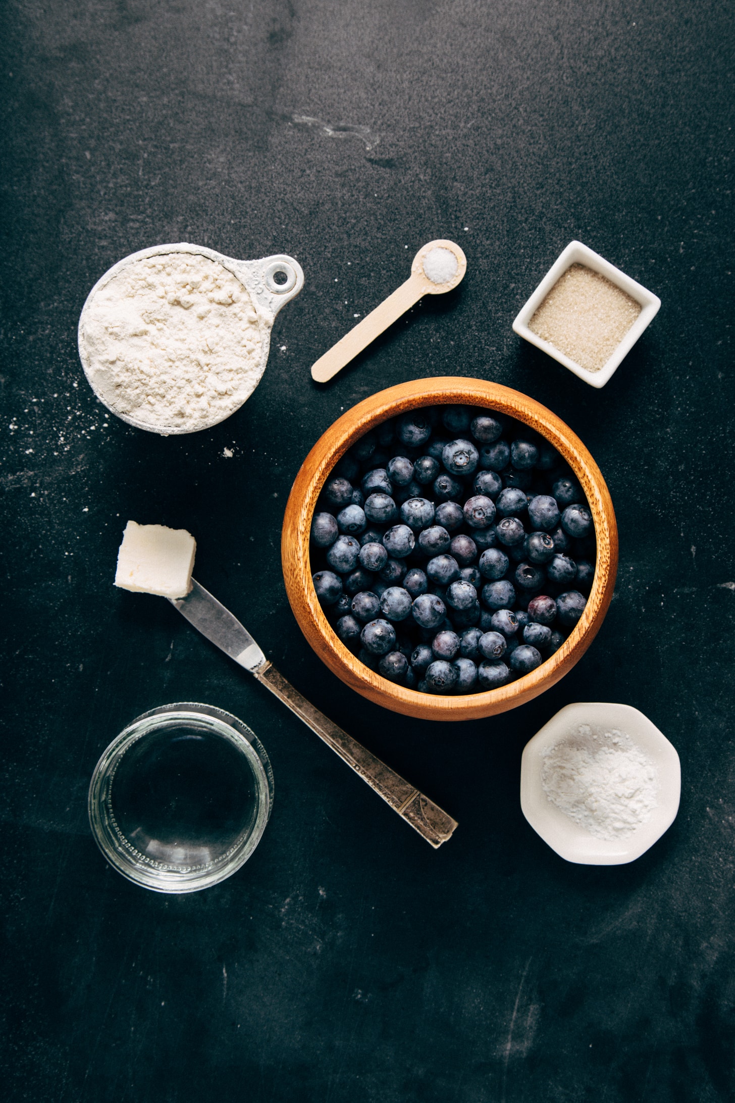 Assortment of ingredients for making simple vegan gluten-free Mini Blueberry Galettes